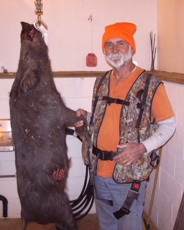 Ron Garrido and wild boar he shot 1/13/14 by Patterson, CA, first black powder shot on this ranch!